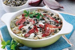 Torta salata di alici con cipolle e pomodori